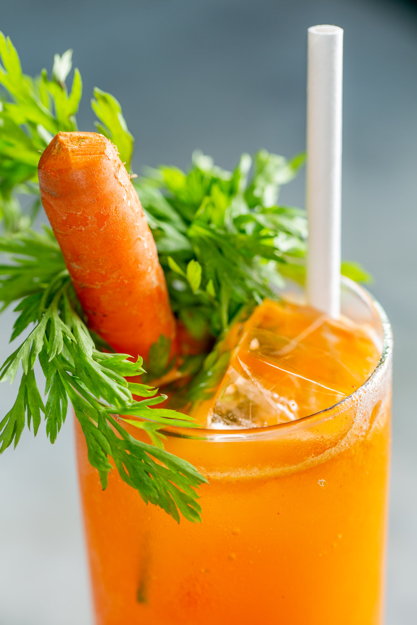 closeup of a carrot topped cocktail