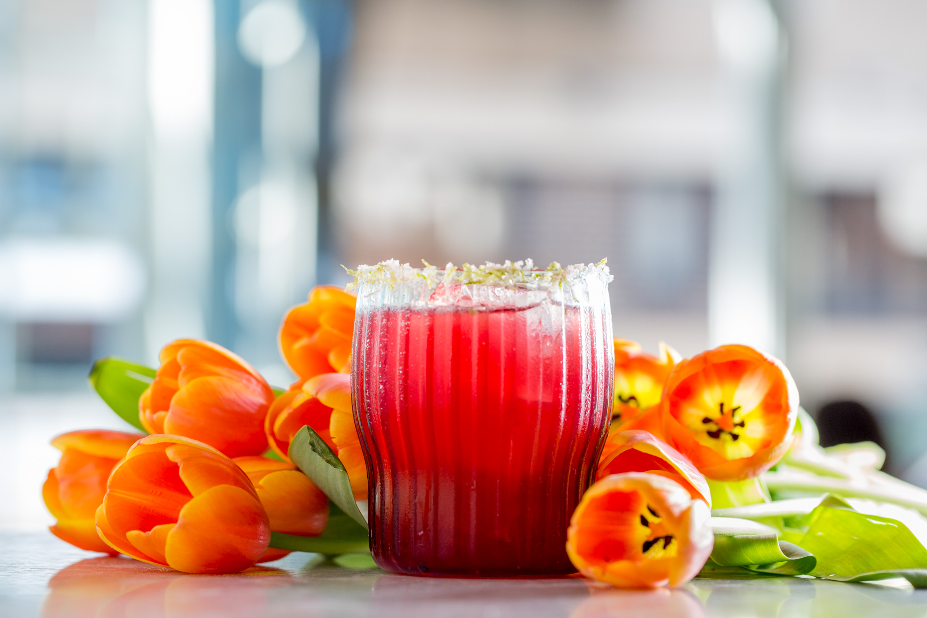 Tulips adorning a beautifully colorful cocktail